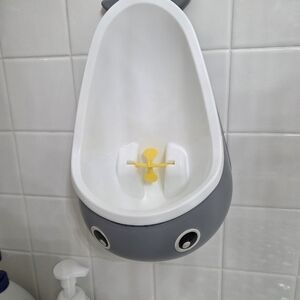 Gray and White Whale Potty Trainer